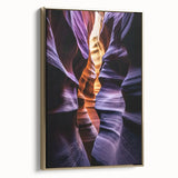 Framed canvas artwork showcasing a stunning landscape of canyons, featuring rich earth tones and intricate details, accented by a stylish gold frame, perfect for home decor.