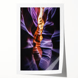 Vibrant landscape print showcasing majestic canyons in rich earth tones, rolled and ready for display, perfect for enhancing any home decor with natural beauty.