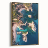 Framed canvas artwork depicting a stunning landscape of rocky cliffs bathed in golden hues, showcasing intricate details and textures, perfect for enhancing modern decor.