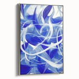Framed abstract geometric canvas art in silver tones, showcasing a modern design with sharp lines and shapes. Ideal for contemporary home décor, adding elegance and style to any room.