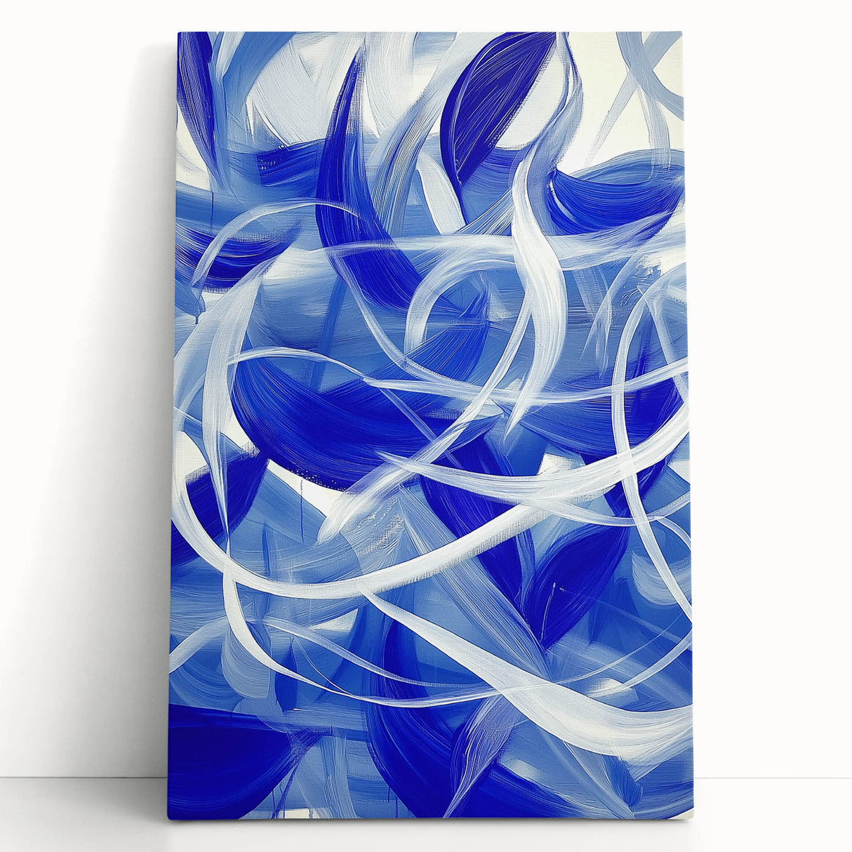 Abstract geometric stretched canvas artwork showcasing vibrant colors and dynamic shapes, leaning against a neutral wall, perfect for modern interior decor.