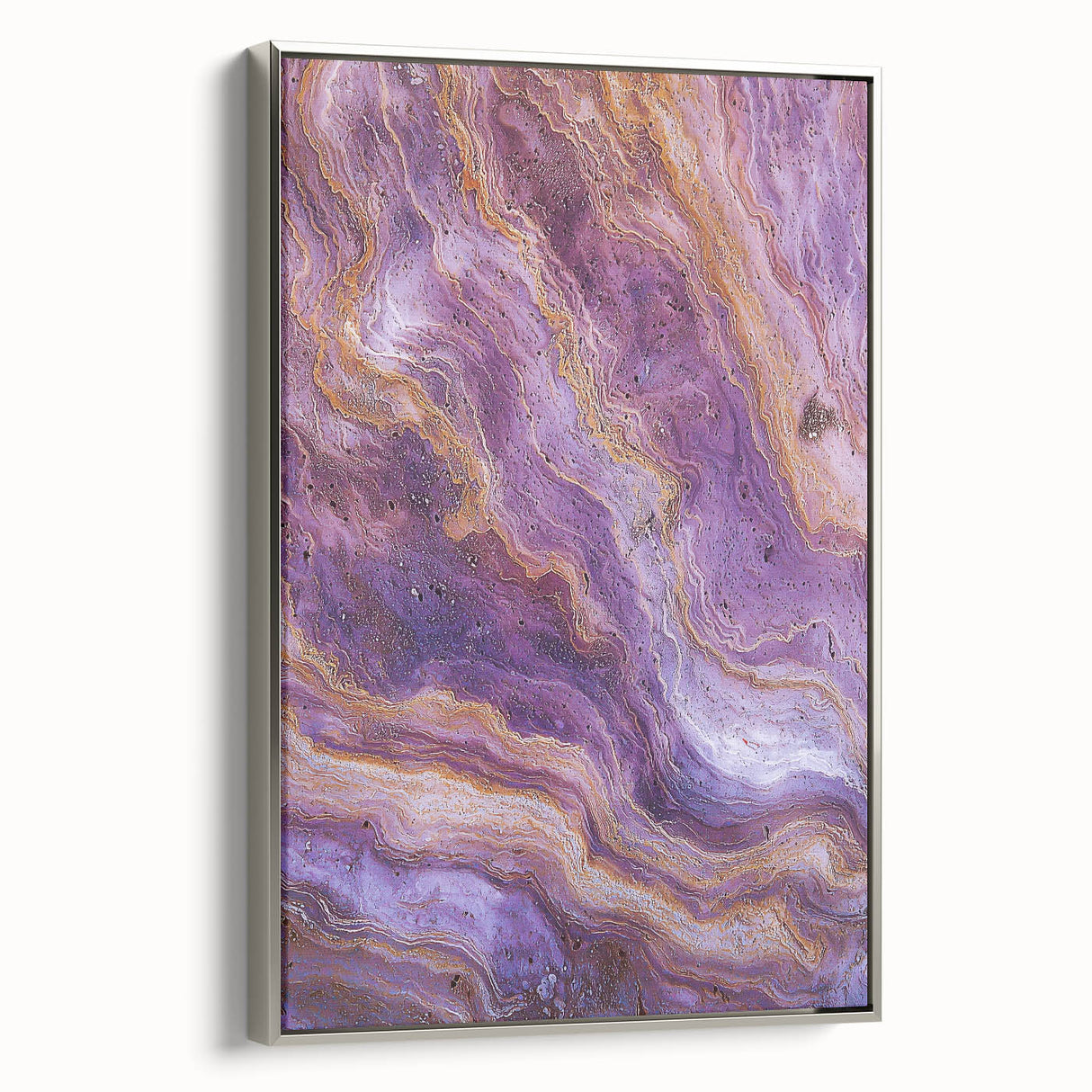Framed canvas artwork depicting a stunning landscape of cliffs, showcasing vibrant colors and intricate details, with a sleek silver frame enhancing its elegance. This piece is perfect for adding a touch of nature-inspired decor to any room.