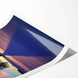 Scenic countryside landscape rolled print showcasing vibrant green fields, distant hills, and a clear blue sky, elegantly packaged in a protective cardboard tube.