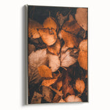 Framed canvas landscape art painting featuring autumn trees in vivid orange and red tones.