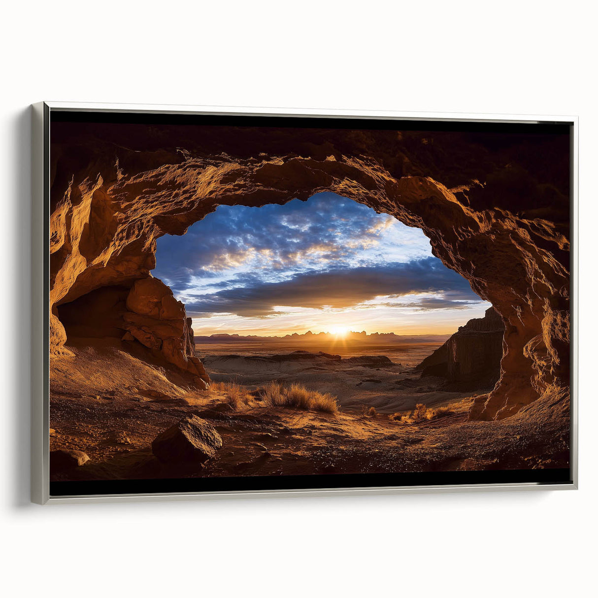 Framed canvas artwork showcasing a stunning landscape of caves, featuring a silver frame that highlights the intricate details and colors, perfect for home decor.