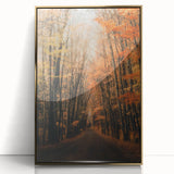 Large art print of an abstract fall landscape in gold and orange tones, acrylic framed, mid-century modernist style.