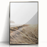 Mid-century modernist art deco poster in silver frame, featuring abstract shapes in soft pastel colors.