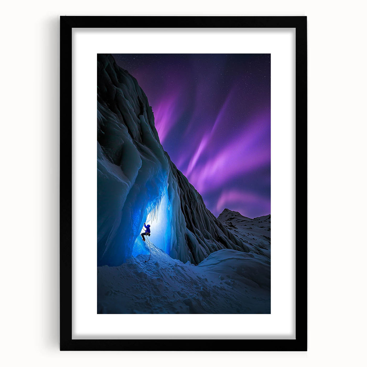 Framed black landscape artwork featuring intricate cave designs and a white mat, showcasing a modern aesthetic perfect for home decor or office spaces.
