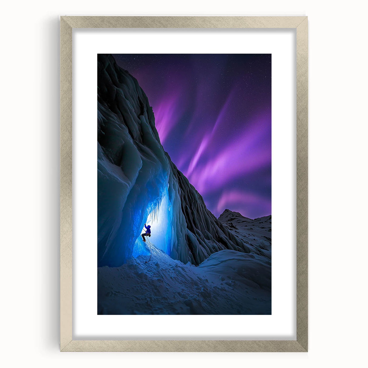 Framed landscape artwork showcasing a serene cave scene, accented with a silver mat, perfect for home decor or gallery displays, capturing natural beauty and tranquility.