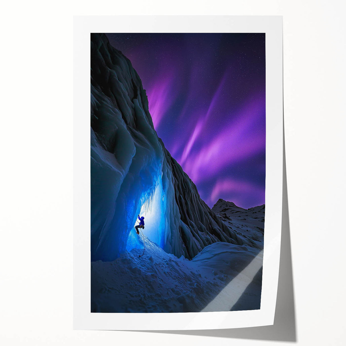 Vibrant rolled print of a stunning landscape featuring dramatic cave formations and lush greenery, ideal for home decor or art enthusiasts.