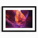 Framed landscape artwork showcasing a stunning canyon scene, featuring a black mat and sleek frame, perfect for enhancing modern home decor.