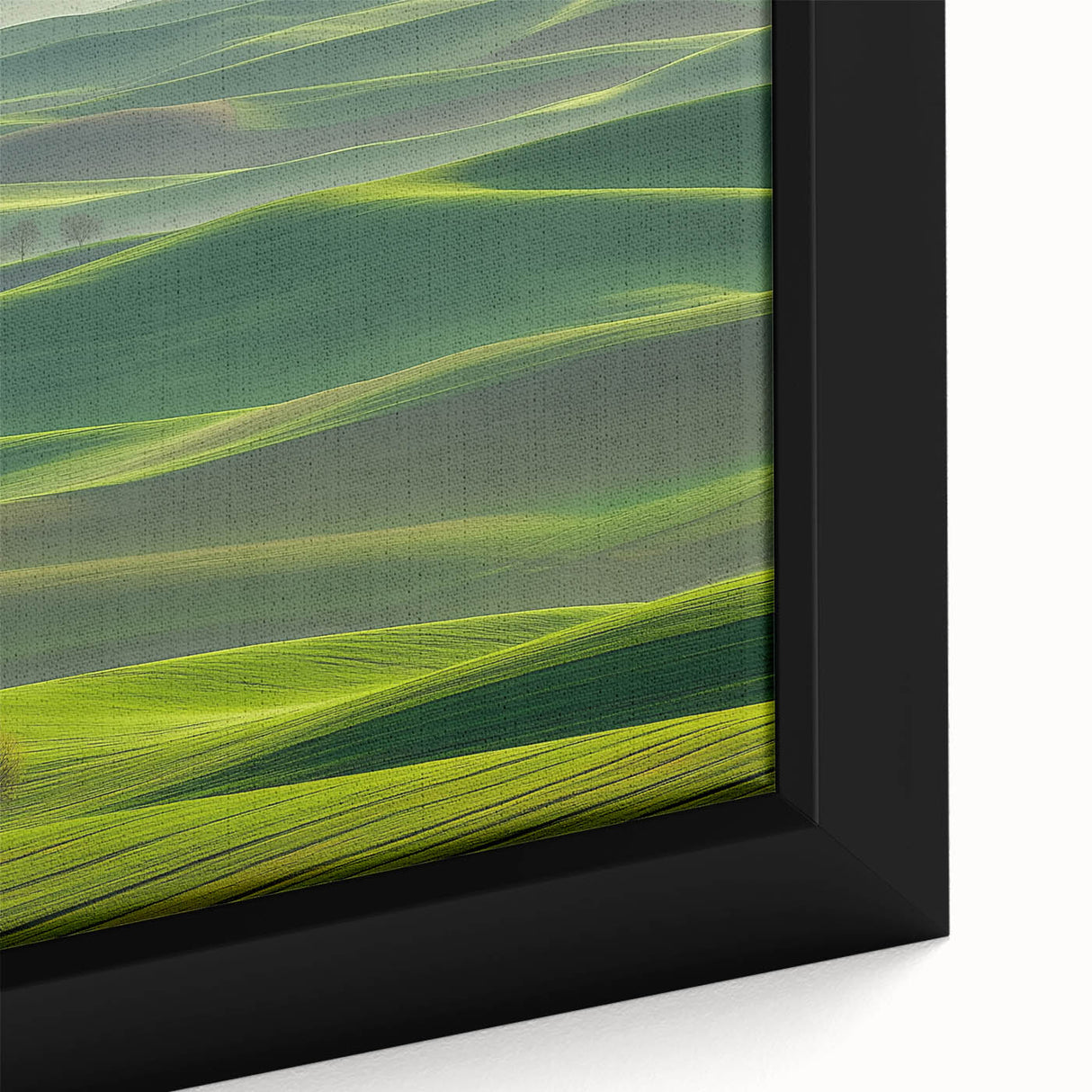 Framed canvas art showcasing a vibrant countryside landscape with rolling hills and a clear blue sky, adding natural beauty to home decor.