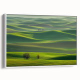 Framed canvas artwork depicting a serene countryside landscape in vibrant colors, showcasing rolling hills and lush greenery, with a sleek white frame enhancing its elegance. Perfect for home decor and nature-themed interiors.