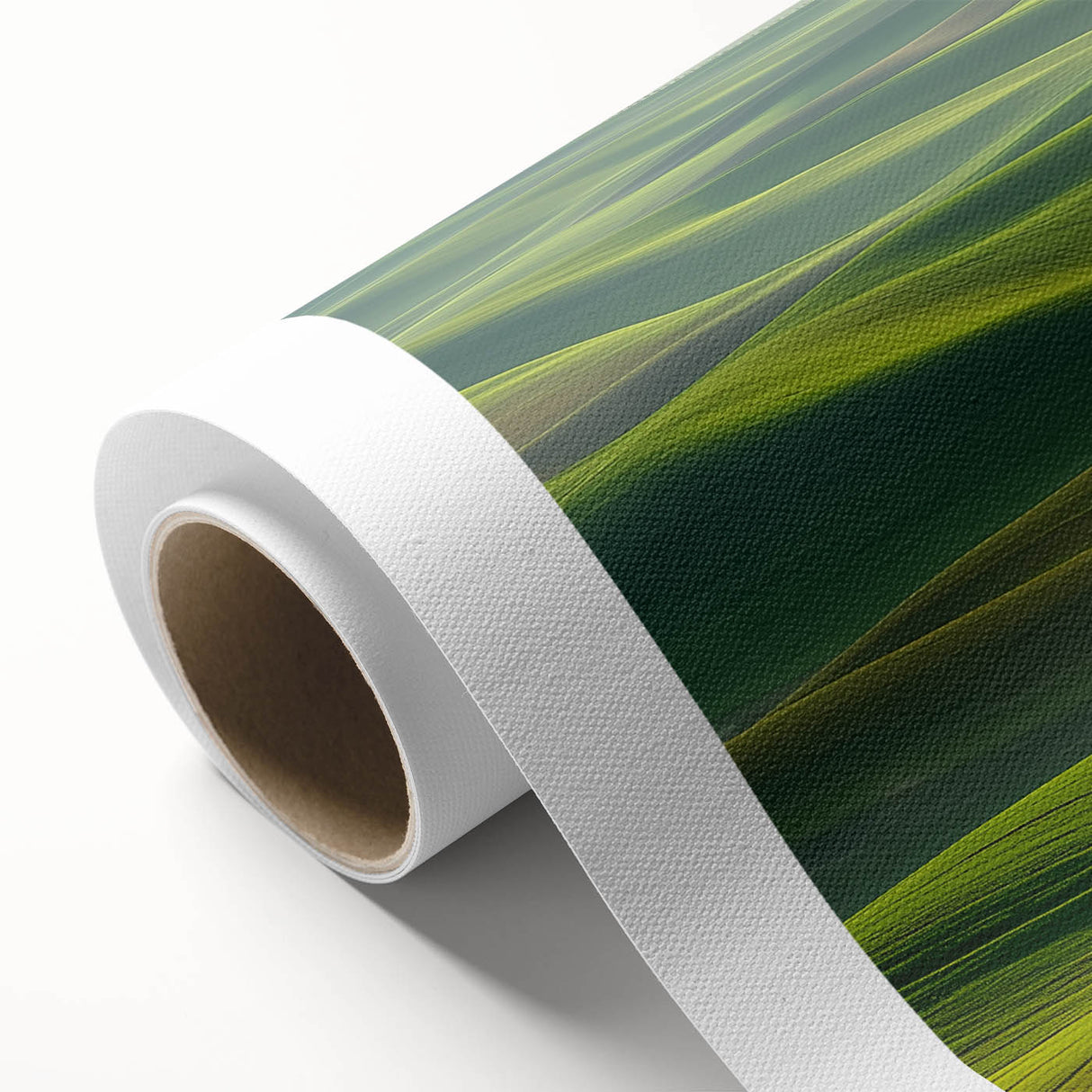 Rolled canvas artwork showcasing a serene countryside landscape, featuring vibrant green fields, a clear blue sky, and distant hills, ideal for home decor.