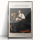 Art deco poster of Caravaggio's design in silver framed acrylic, featuring dark and light contrasts.