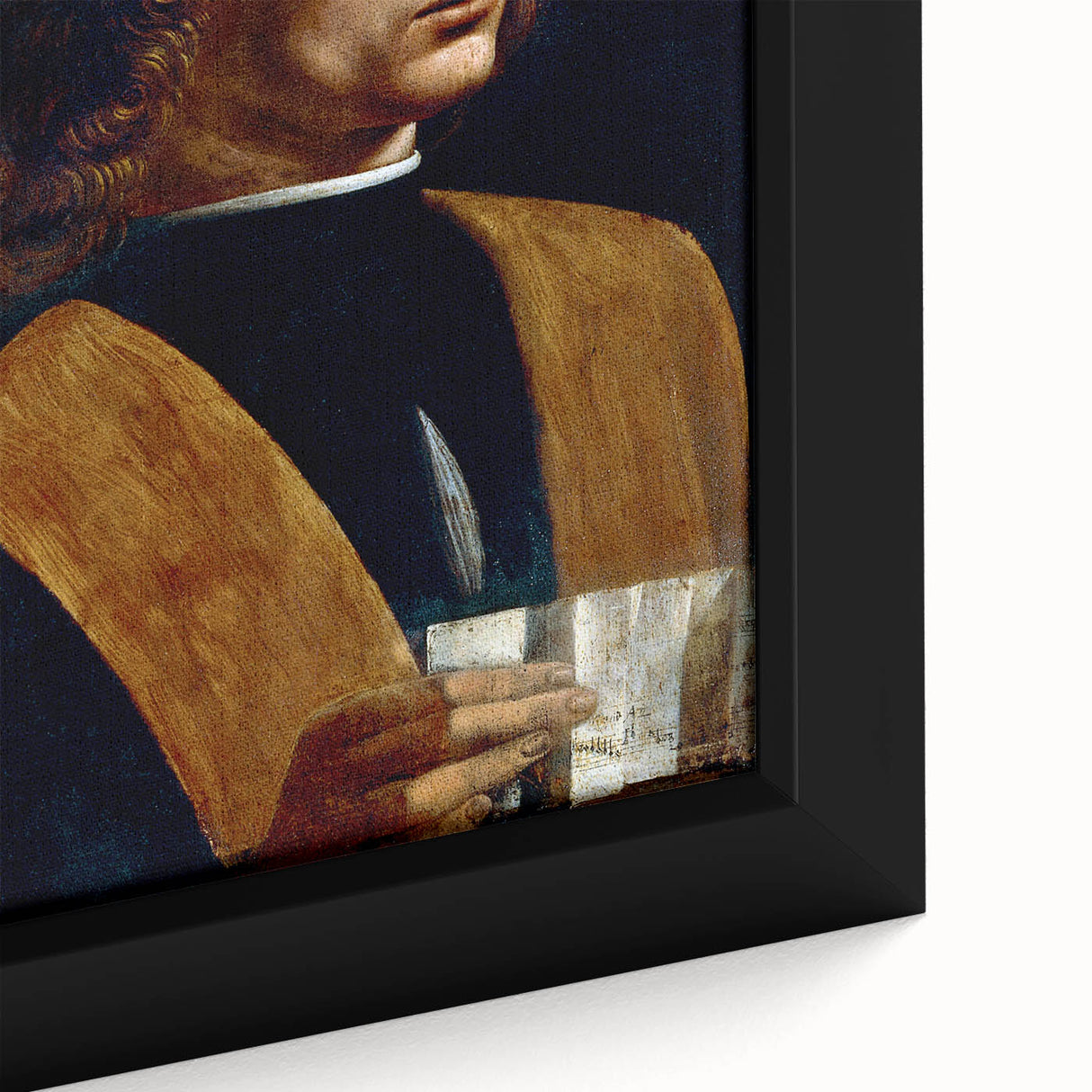 Close-up of a textured black wall art depicting Leonardo da Vinci, with colorful accents on a framed canvas.