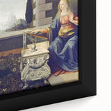 Close-up of a textured black wall art piece depicting Leonardo da Vinci's work, with vibrant color accents.