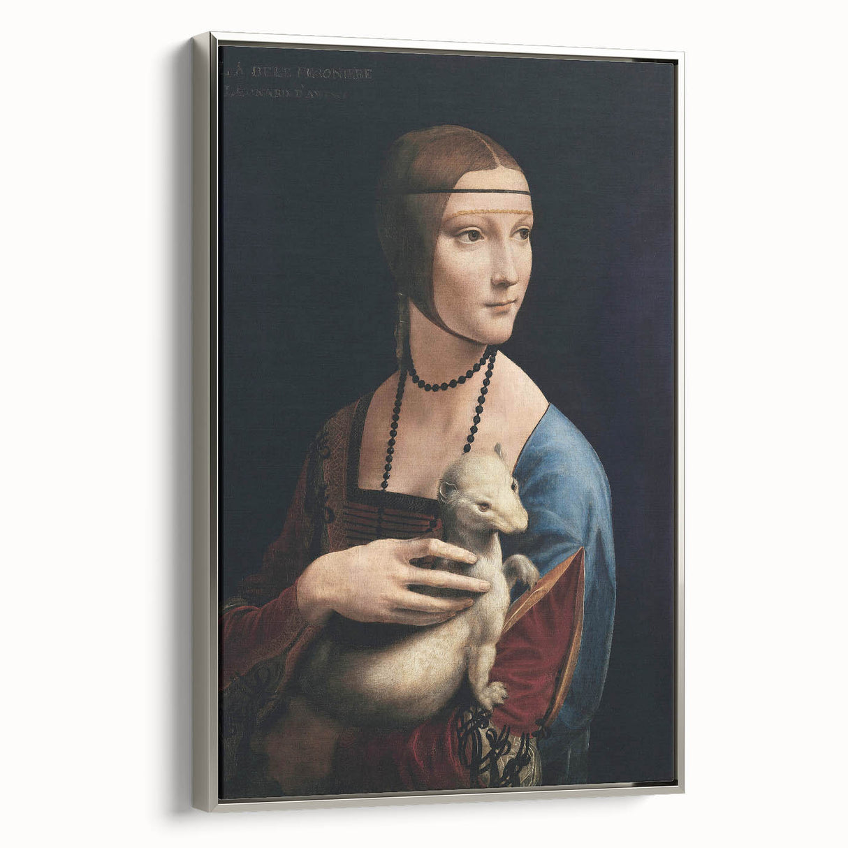 Vintage poster art of Leonardo da Vinci on a framed canvas, featuring colorful art in a black palette.