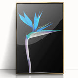 Framed wall art featuring a vibrant bird of paradise design, showcasing rich colors and intricate botanical details, set against a sleek gold frame for an elegant look.
