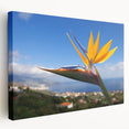 Stretched canvas wall art showcasing a vibrant Bird of Paradise floral design, featuring rich colors and intricate details, perfect for home decor enhancement.