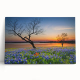 Vibrant botanical canvas wall art featuring bluebonnets in rich hues of blue and green, elegantly leaning against a neutral wall, enhancing decor with a natural touch.