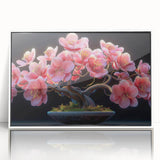 Framed acrylic wall art featuring a botanical bonsai tree design, showcasing intricate floral details and a modern white frame, ideal for home or office decor.