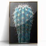 Framed wall art featuring a botanical cactus design with gold accents, showcasing vibrant green cacti against a neutral background, perfect for home decor.