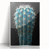 Framed botanical wall art featuring a vibrant cactus design against a white background, perfect for modern home decor, adding a touch of nature and color.