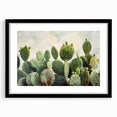 Botanical wall art featuring a vibrant cactus design in a sleek black frame with a mat, ideal for modern decor, showcasing intricate details and colors.