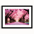 Elegant black-framed botanical wall art showcasing a delicate cherry blossom design, featuring a white mat for a refined look, perfect for home decor.