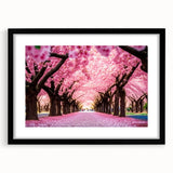 Elegant black-framed botanical wall art showcasing a delicate cherry blossom design, featuring a white mat for a refined look, perfect for home decor.