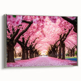 Framed canvas wall art showcasing a beautiful cherry blossom botanical design, featuring delicate pink flowers and a silver frame, perfect for home decor.
