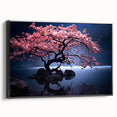 Framed canvas wall art showcasing a botanical cherry blossom design, featuring soft pink flowers and delicate green leaves, set against a sleek black frame, perfect for enhancing home decor.