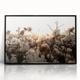 Framed botanical wall art collection showcasing vibrant floral designs on cotton fabric with a sleek black frame, ideal for modern home decor.
