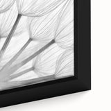 Close-up of a framed botanical wall art piece showcasing intricate dandelion designs in vibrant yellows and greens, perfect for home decor. Ideal for nature enthusiasts and modern interiors.