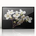 Framed botanical wall art featuring a dogwood design in vibrant colors, set against a sleek black frame, ideal for enhancing home decor and nature-themed interiors.