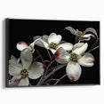 Framed botanical wall art featuring a dogwood flower design on a black background, showcasing intricate details and vibrant colors, perfect for home decor.