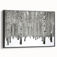 Framed canvas wall art showcasing a vibrant floral design with botanical forest trees, set against a sleek black frame, ideal for modern home decor.