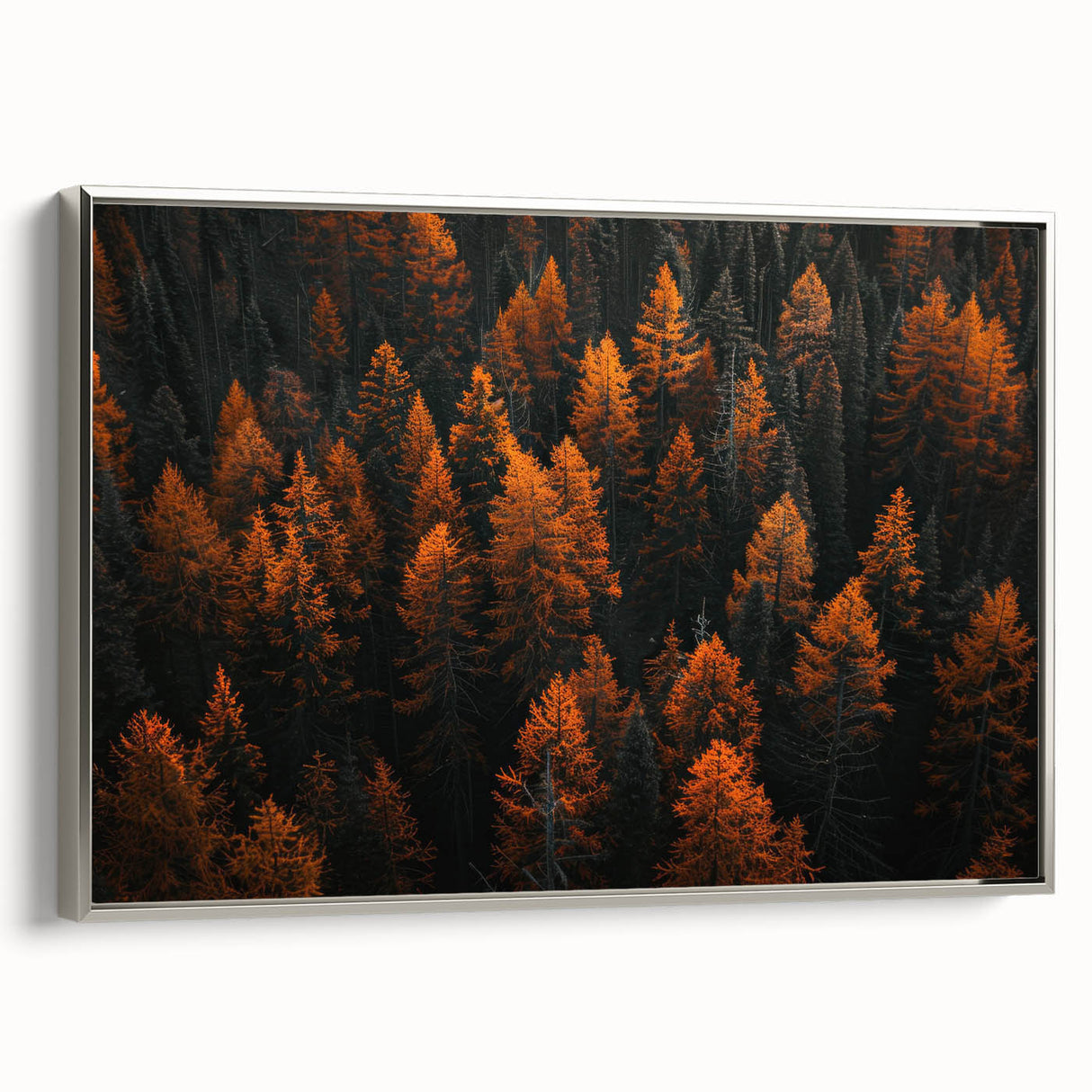 Framed canvas wall art showcasing a botanical forest design with vibrant flowers and trees, featuring a sleek silver frame and side view for added elegance.