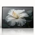Framed wall art showcasing a vibrant hibiscus botanical design with a black frame, perfect for home decor or as a unique gift. Features intricate floral details and a modern aesthetic.