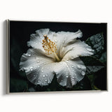 Framed wall art showcasing a botanical hibiscus design in vibrant colors, displayed from a silver side view, perfect for home decor enthusiasts. Ideal for brightening up living spaces with its floral elegance.