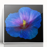 Framed wall art featuring a vibrant botanical design of hibiscus flowers in shades of pink and green, showcasing intricate details and a sleek white frame, perfect for home decor.