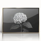 Framed wall art featuring a botanical hydrangea design with gold accents, showcasing vibrant blue and pink flowers against a textured background, perfect for home decor.