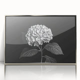 Framed wall art showcasing a stunning botanical hydrangea design in vibrant blue and purple tones, set in a sleek silver frame, perfect for home decor.