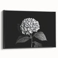 Framed wall art featuring a botanical hydrangea design in vibrant colors, showcasing detailed floral elements against a sleek black frame, ideal for home decor.