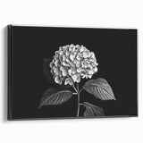 Framed wall art featuring a botanical hydrangea design in vibrant colors, showcasing detailed floral elements against a sleek black frame, ideal for home decor.