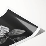 Hydrangea botanical wall art print showcasing vibrant blue and green hues on textured paper, rolled for easy framing, ideal for home decor enthusiasts.
