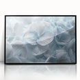 Framed wall art showcasing a vibrant botanical hydrangea design in rich blues and greens, presented in a sleek black frame, ideal for home decor and nature lovers.