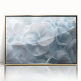 Framed botanical wall art featuring a vibrant hydrangea design in rich shades of blue and pink, accented with a sleek gold frame, perfect for home decor.