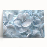 Botanical wall art featuring a vibrant hydrangea design on stretched canvas, showcasing delicate pink and blue flowers against a subtle white backdrop, perfect for home decor.